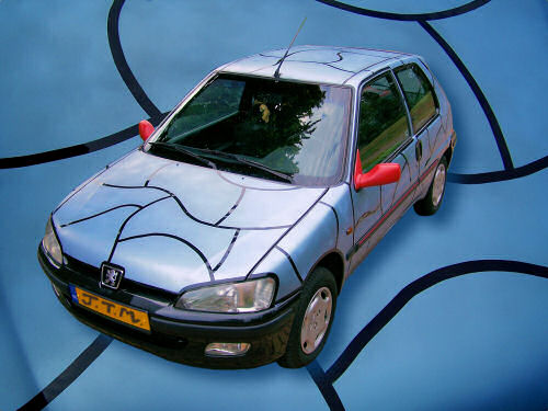 Not pimped but funky nevertheless // ca. 2 x 3 x 1,5 m // spray paint on car // 2006 // 12746 views